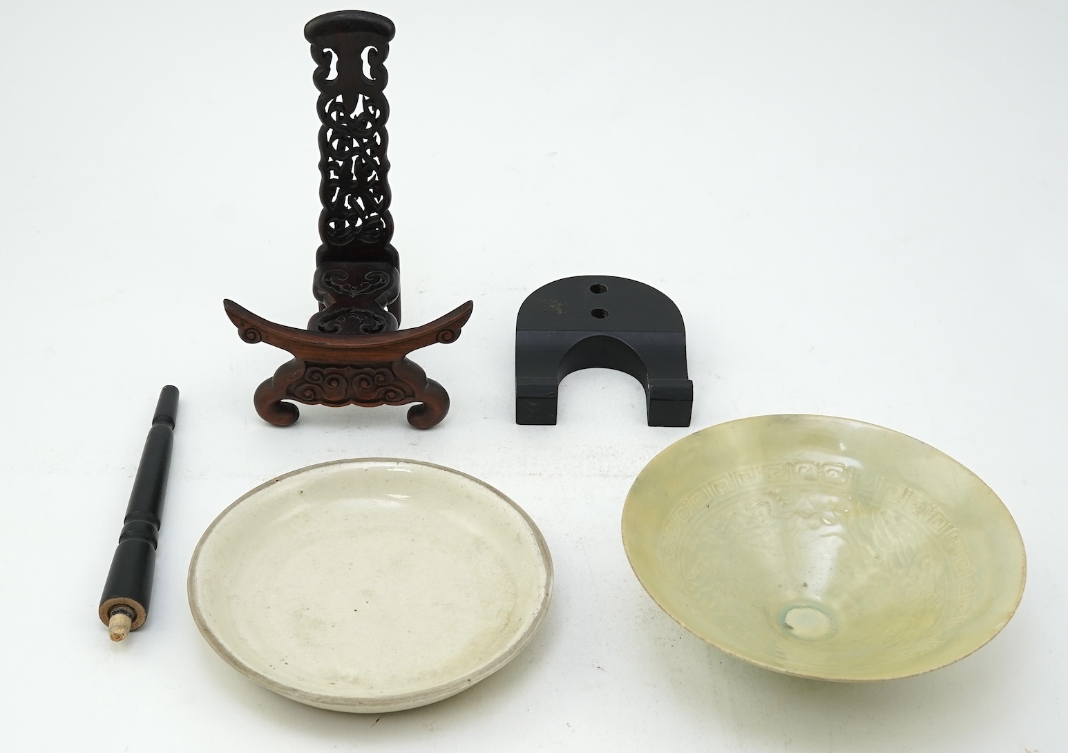 A Chinese Ding type circular dish, Song dynasty and a qingbai moulded conical bowl, Song-Yuan dynasty